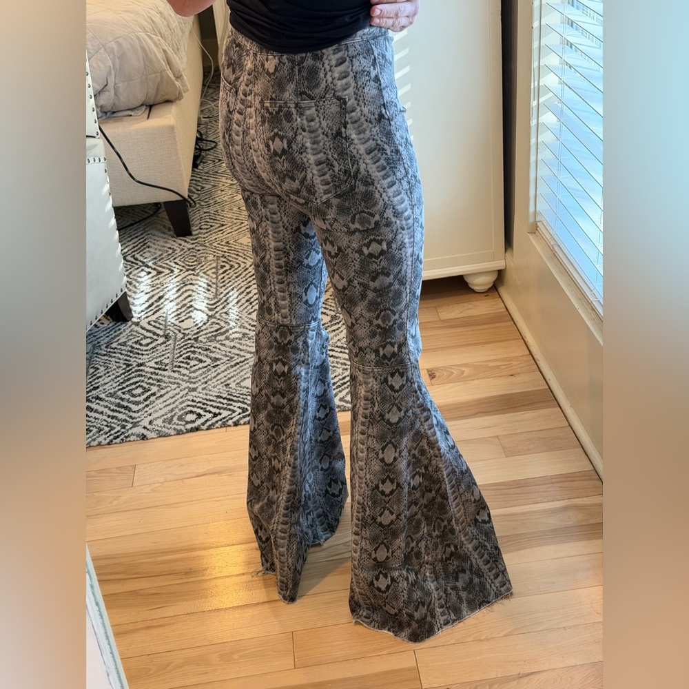 Free People We The Free Just Float On flare jeans in a gray snake print. - Picture 3 of 5